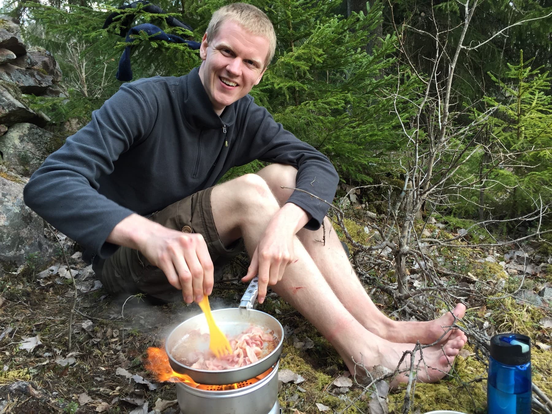 Ole preparing dinner bacon